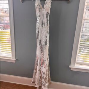 Jovani style # 23319 Elegant Silver and White Sequin Gown